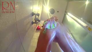 Voyeur Camera In The Shower. A Nude Girl In The Shower Is Washed With Soap.