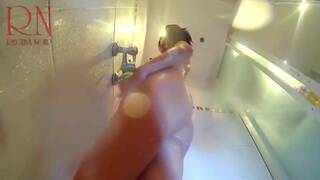 Voyeur Camera In The Shower. A Nude Girl In The Shower Is Washed With Soap.